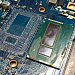 Оторванные пятаки и испорченная маска на плате ноутбука под CPU